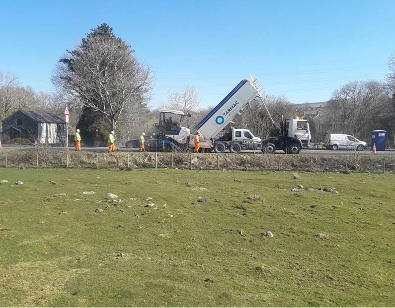 Workers from contractor Tarmac working in adherence to social distancing rules during A487 Oakeley Drive scheme