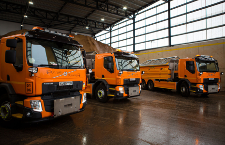 three gritters in depot