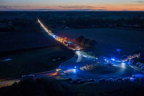 abnormal load aerial view of road overnight