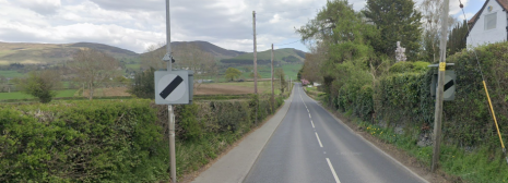 Road with trees in the distance.