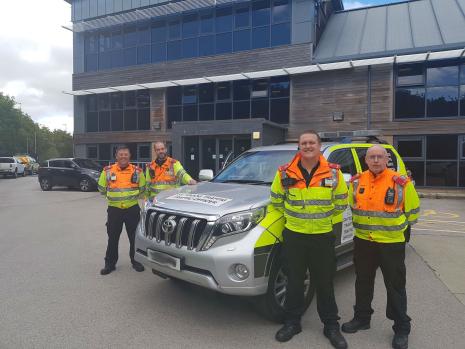 4 Traffic Officers with vehicle outside the Traffic Management Centre